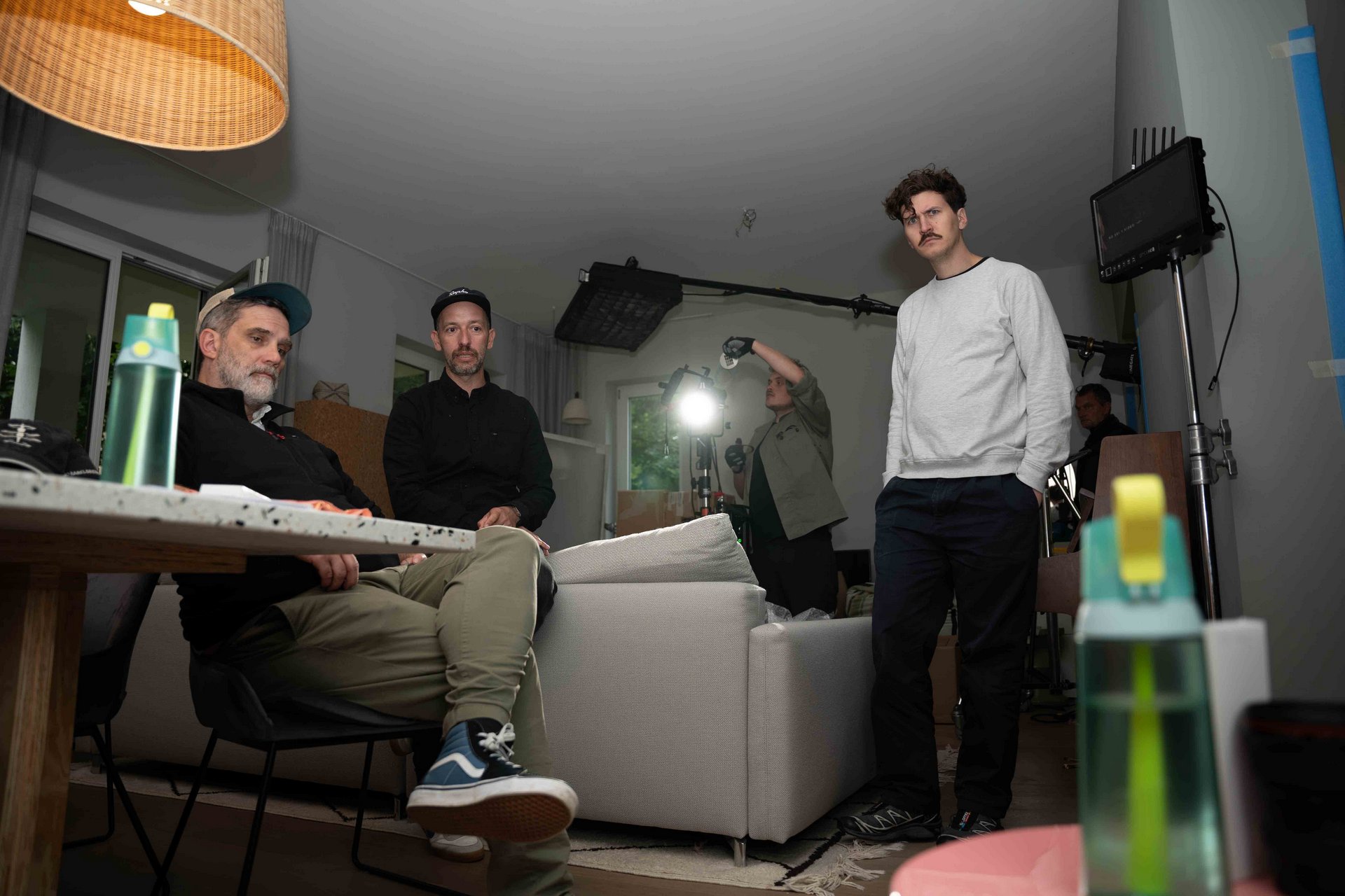 clients, film crew and photographers on the film set