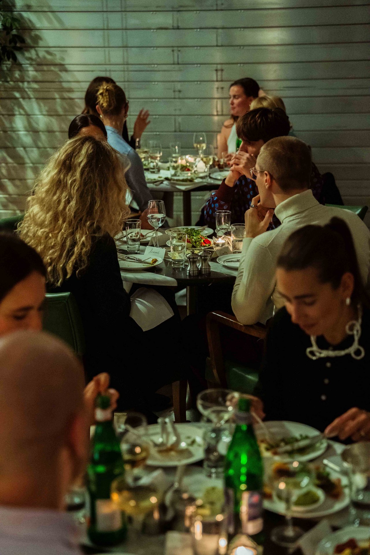 clients, film crew and photographers on the film set