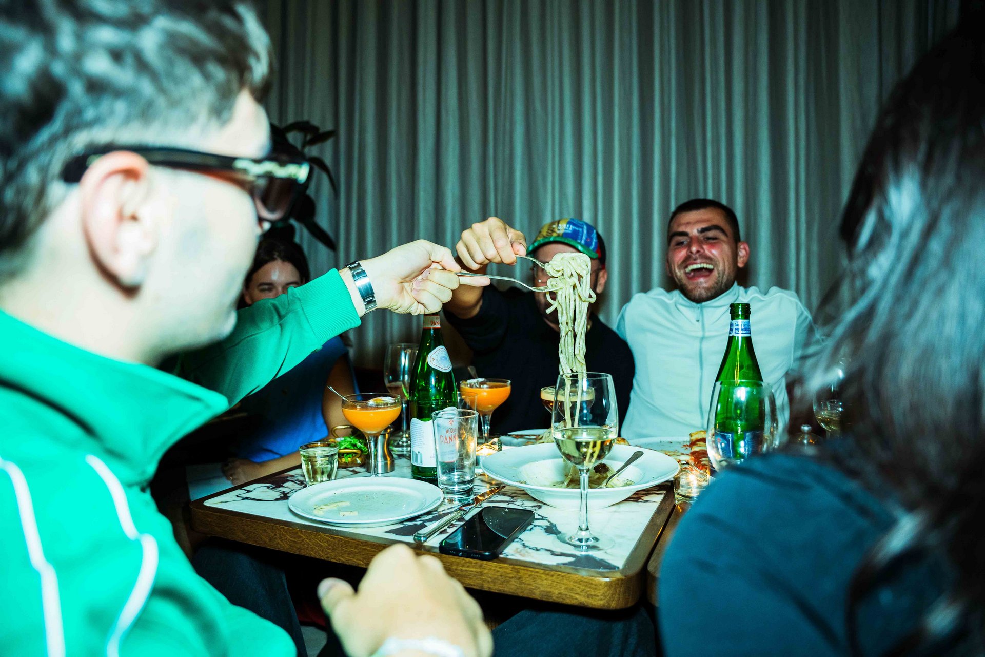 setup for a food commercial with the film crew, actors and director